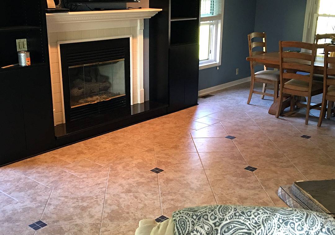 tiled floor leads to fireplace
