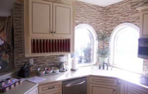 Kitchen backsplash with windows and cabinets